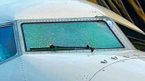 The cracked windshield is being taken to the National Transportation Safety Board’s laboratory to further determine the cause of damage
