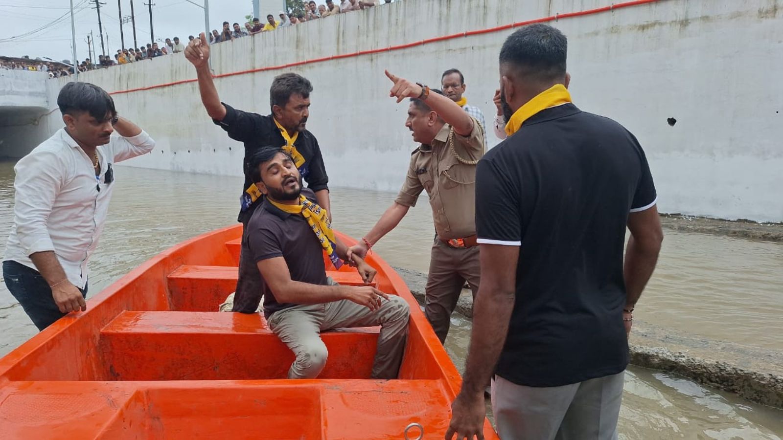 AAP leader, workers booked for using govt boat for rescue ops to hold protest at flooded underbridge 