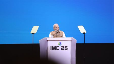 Caption: PM Modi onstage at the inauguration of IMC 2025 at Yashabhoomi Convention Centre in Delhi. (Image: IMC)