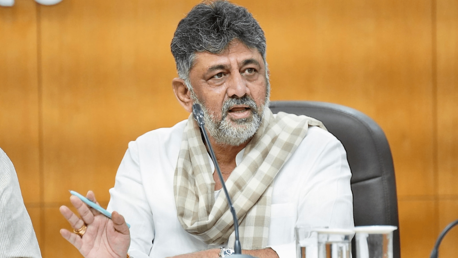 Shivakumar said the initiative helps regularise B-Khata sites and challenged Kumaraswamy to a public debate.