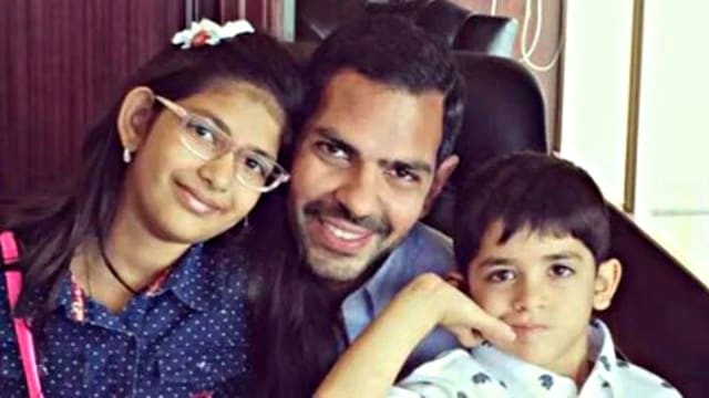 File photo of Sunjay Kapoor (centre) with his kids Samaira (left) and Kiaan. (File photo)