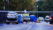 Police investigation continues at the scene near Heaton Park Hebrew Congregation Synagogue in Crumpsall, Manchester, England Friday, Oct. 3, 2025. (Peter Byrne/PA via AP)