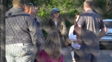 Family members gather at Accurate Energetic Systems, an explosive plant, after a blast on Friday resulted in multiple fatalities and several missing on Saturday, Oct 11, 2025, in Bucksnort, Tenn. (AP photo/ Obed Lamy)