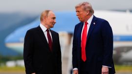 US President Donald Trump and Russia's President Vladimir Putin talk at Joint Base Elmendorf-Richardson, Alaska. (AP Photo)