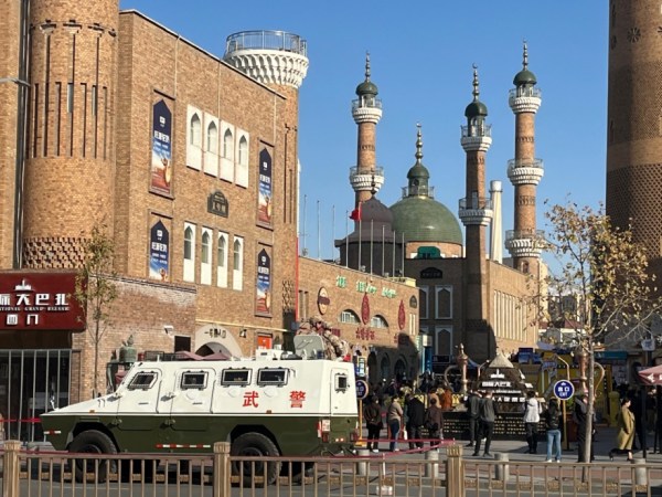 An armored personnel carrier in front of the Grand Bazaar in a heavily Uyghur neighborhood of Urumqi on Oct. 23, 2024