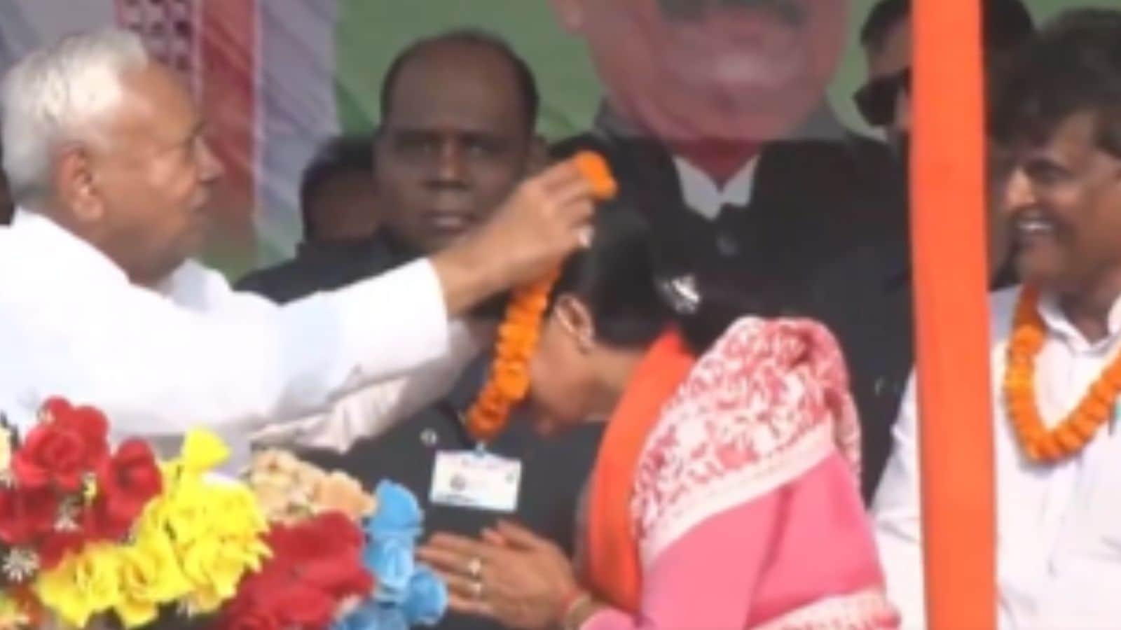 ‘Strange man indeed’: Tejashwi Yadav mocks Nitish Kumar over his viral video garlanding BJP candidate