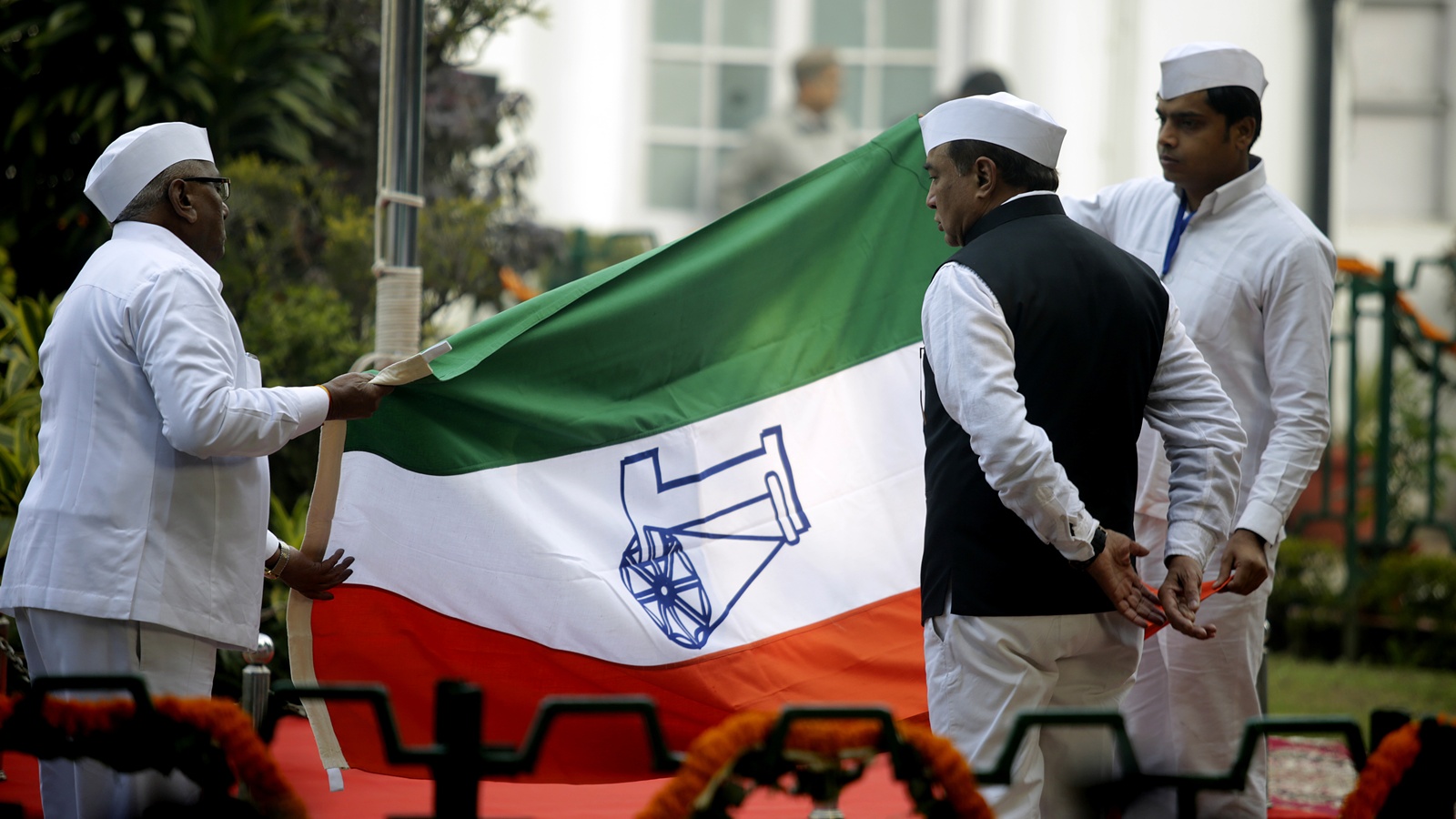 Congress party workers carrying Congress Flag.