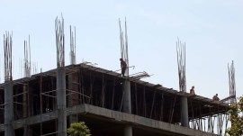 Labourers working at an under construction site.