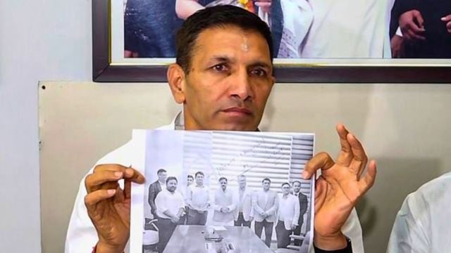 Madhya Pradesh Congress President Jitu Patwari holds a press conference demanding the resignation of the state health minister over the deaths of children allegedly caused by cough syrup, in Bhopal, Madhya Pradesh, Saturday, Oct. 11, 2025. (PTI Photo)