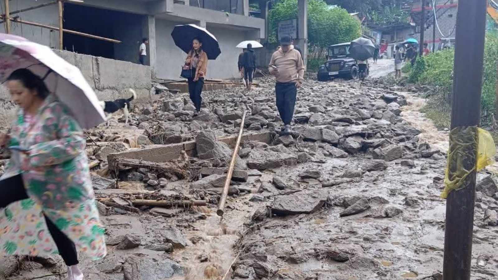 The landslides have severely damaged key road networks, including the National Highways 10 and 717A (Photo credit: @RajuBista/X)