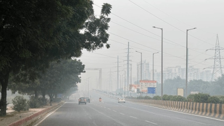 Parthala flyover in Noida barely visible through a dense cover of smog