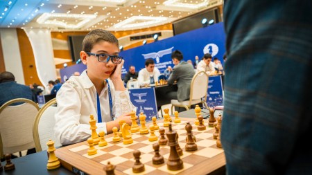 Faustino Oro, the 11-year-old prodigy from Argentina, competes at the FIDE Rapid and Blitz tournament two years ago. (PHOTO: FIDE/Lennart Ootes)