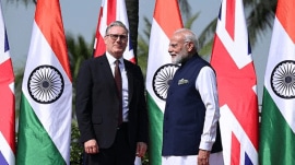 British Prime Minister Keir Starmer, left is greeted by Indian Prime Minister Narendra Modi on his arrival at Raj Bhavan in Mumbai