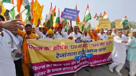 Each held either a tricolour in hand, riding bikes and tractors with banners and posters reading 'Yaduvanshi', or on cars that blared songs invoking Yadav/Ahir pride, as youth danced along.