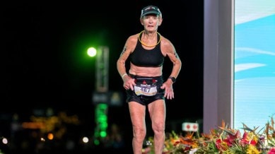 80-year-old American Natalie Grabow earns her world record at the Kona Ironman World Championship in Hawaii. (Photo: Ironman)