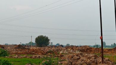 Paddy stubble lying in open on Patiala- Sirhind road for more than a year (Express pics by Raakhi Jagga)