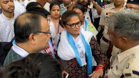 TMC MP Sushmita Dev with police personnel on her arrival at Agartala airport
