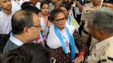 TMC MP Sushmita Dev with police personnel on her arrival at Agartala airport