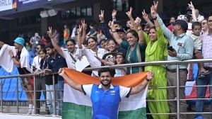 Yogesh Kathuniya celebrating with family after winning silver medal at the World Para Athletics Championships. (PritishRaj/ExpressPhoto)