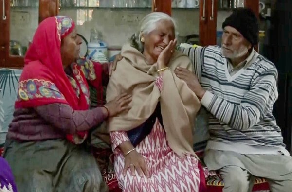 Relatives of Wing Commander Namansh Syal mourn his loss in the LCA Tejas crash in Dubai, at Patiyalkar village, in Kangra on Saturday. (ANI Video Grab)