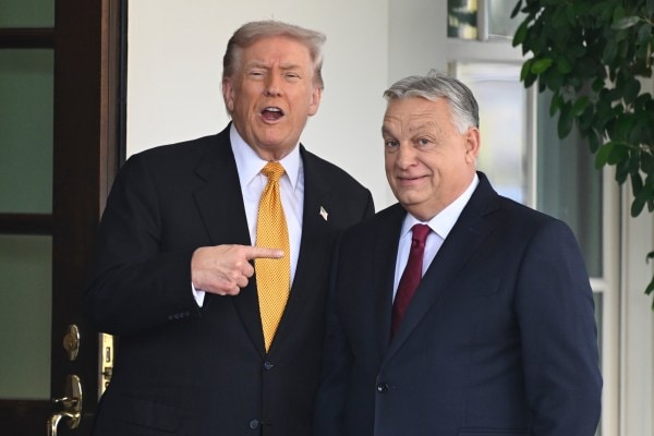President Donald Trump, left, greets Hungary's Prime Minister Viktor Orban at the White House, Friday, Nov. 7, 2025, in Washington. (AP Photo/John McDonnell)
