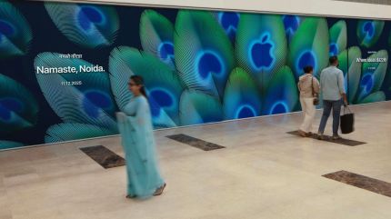 The newly unveiled peacock-themed barricade at Apple Noida, set to open on December 11 at DLF Mall of India. (Image: Apple)