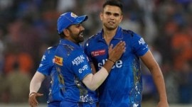 File image of Mumbai Indians' Arjun Tendulkar being congratulated by Rohit Sharma, as they celebrate the wicket of Sunrisers Hyderabad's Bhuvneshwar Kumar. (AP)