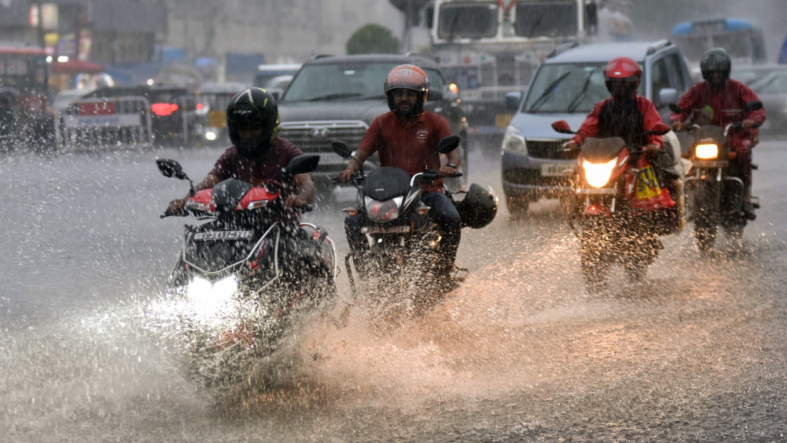 Bengal weather update: Motorists drive through the rain in Kolkata.