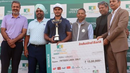 Manu Gandas, winner of PGTI's Trident Open, with Kapil Dev during prize distribution at Chandigarh Golf Club on Friday. (Photo: Kamleshwar Singh)
