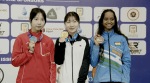 (L-R)- Wang Zifei (China), Ban Hyojin (Korea) and Elavenil Valarivan (India), on the podium after the women's 10m air rifle final at the Cairo ISSF World Championship Rifle/Pistol on Saturda (Credit: NRAI)