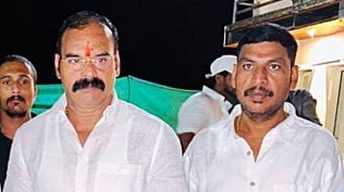 An old photo of Gangster Gajanan Marne (left), who has close to 30 criminal cases against him, is seen with Sunil Bansode (right).