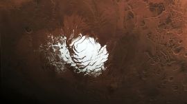 The European Space Agency’s Mars Express orbiter captured this view of Mars’ south polar ice cap Feb. 25, 2015. Three years later, the spacecraft detected a signal from the area to the right of the ice cap that scientists interpreted as an underground lake. (Image: ESA)