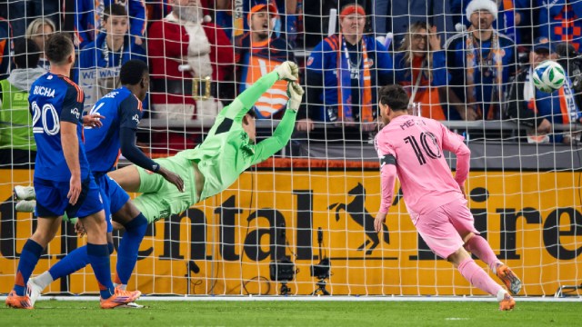Inter Miami forward Lionel Messi scores as FC Cincinnati goalkeeper Roman Celentano, third from left, tries to save his shot during the first half of MLS soccer's Eastern Conference semifinal Sunday, Nov. 23, 2025, in Cincinnati. (AP Photo)