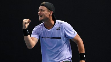 File image of Australia's Lleyton Hewitt celebrating with compatriot John-Patrick Smith during their first round doubles match at the Australian Open in 2019. (AP Photo)