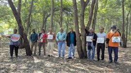 Citizens and environmentalists protesting against felling of trees in Nashik.