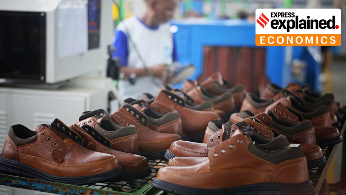QCO: Workers at a shoe export factory in Sikandra, near Agra, UP. (Express photo by Tashi Tobgyal)