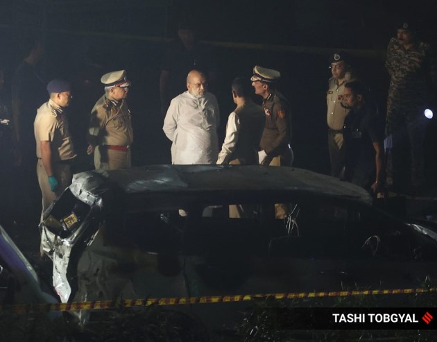 Union Home Minister Amit Shah inspects at the site of the Car bomb blast near Red Fort in Old Delhi on Monday. (Express Photo/Tashi Tobgyal)