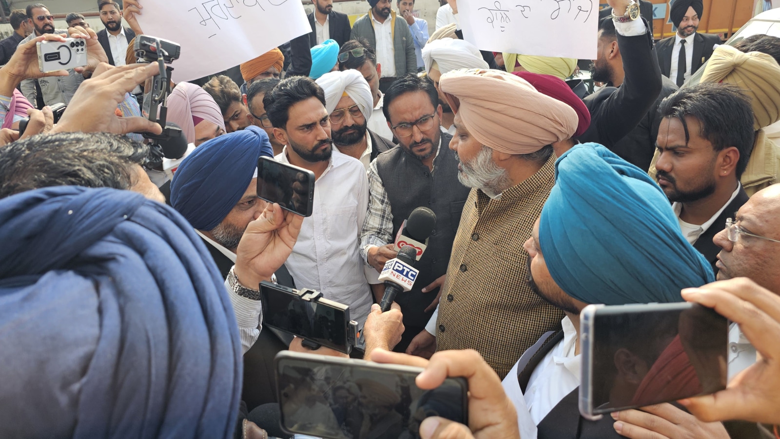 Finance minister Harpal Singh Cheema trying to pacify protesting lawyers in Sangrur last week. 