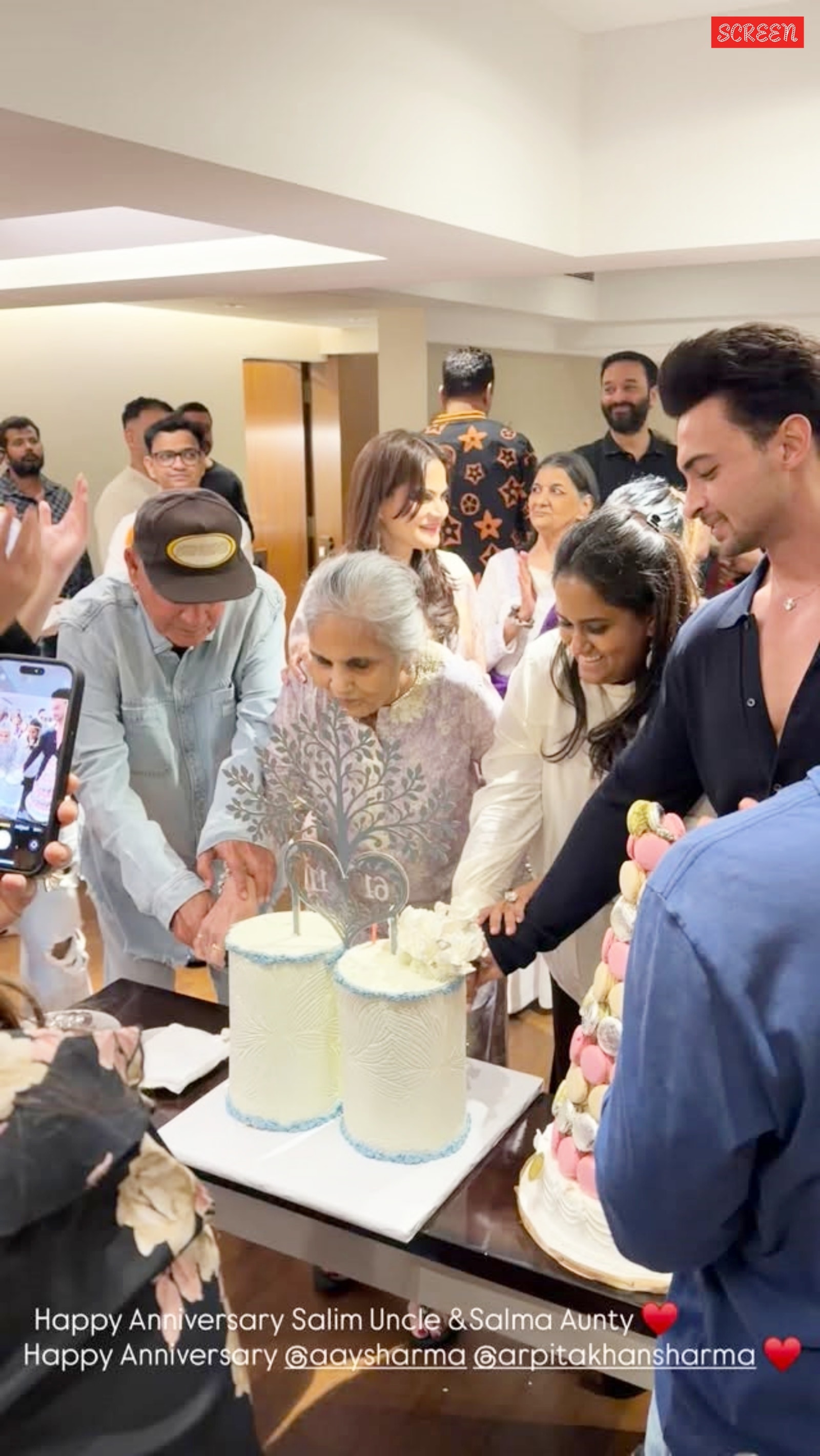 Salim Khan and Salma Khan cut the cake at their wedding anniversary celebrations.
