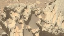 Scientists questioned why the rock seemed different from neighbouring terrain and why its form contrasted so sharply with the ordinary native Martian crust. (Image: NASA)