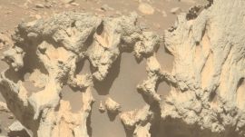 Scientists questioned why the rock seemed different from neighbouring terrain and why its form contrasted so sharply with the ordinary native Martian crust. (Image: NASA)