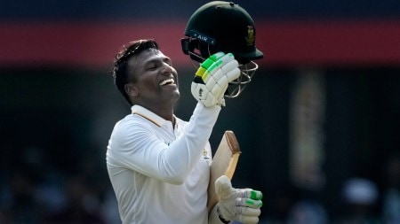 South Africa's Senuran Muthusamy celebrates after scoring a century on the second day of the second cricket test match between India and South Africa in Guwahati, India, Saturday, Nov. 22, 2025. (AP Photo)