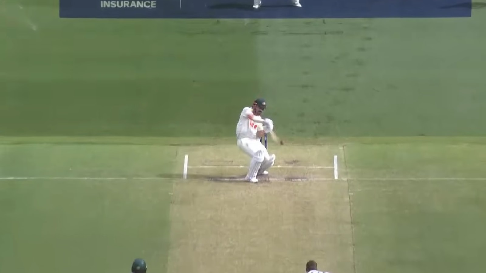 Travis Head hits a boundary through cover point against England's Brydon Carse in the 1st Ashes Test in Perth. (PHOTO: Screengrab via cricket.com.au YouTube)