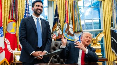 President Donald Trump gestures to New York Mayor-elect Zohran Mamdani as they speak to reporters in the Oval Office of the White House in Washington, on Friday, Nov. 21, 2025. Acid insults were set aside as New York’s mayor-elect and the president promoted their shared goals. (Eric Lee/The New York Times)