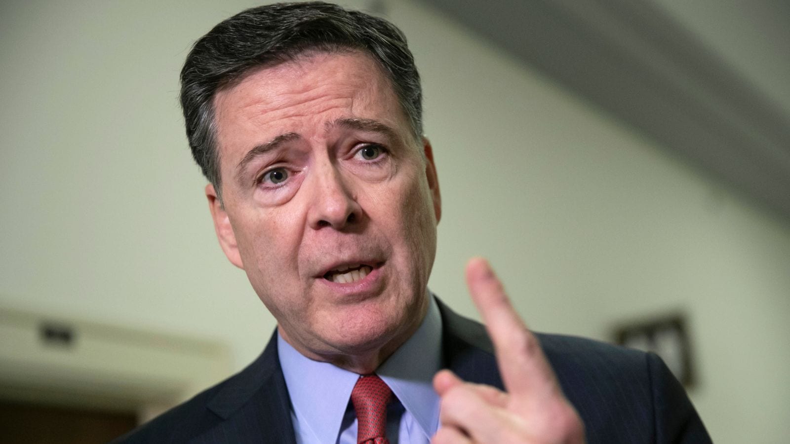 U.S. judge orders DOJ to hand over Comey grand‑jury materials, citing prosecutorial 'misconduct'