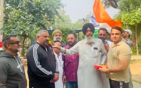 Locals in Moga celebrating the win. (Express photo)