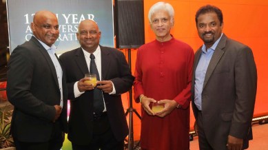 Arjuna Ranatunga, looking taller than ever, and considerably leaner, was smiling in red alongside Sanath Jayasuriya, Aravinda de Silva and Muttiah Muralidaran. (X)
