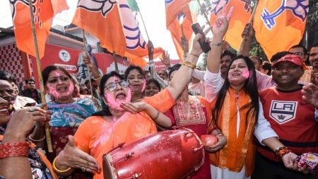 Bharatiya Janata Party supporters celebrate NDA's lead in the vote counting of the Bihar Assembly election 2025