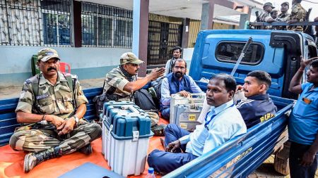 Jehanabad, Nov 10 (ANI): Police personnel with Polling officials with EVM and other election material leave for their respective booths on the eve of the second phase of the Bihar assembly elections, in Jehanabad, on Monday. (ANI Photo)