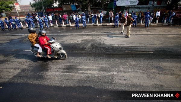 Inside the market, shops had reopened, but the usual throng of street sellers was missing. Still, the lanes had begun to fill again.